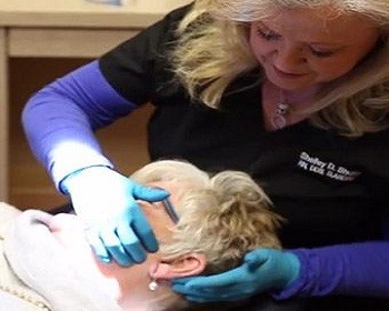 Dentist treating dental patient