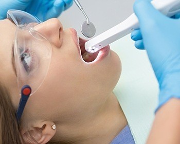 Dentist capturing intraoral images