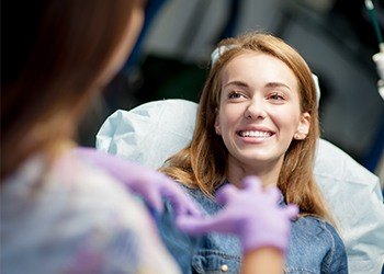 Smiling woman in dental chair