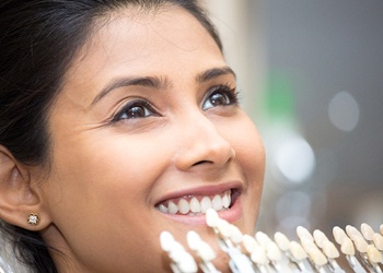 A woman getting porcelain veneers