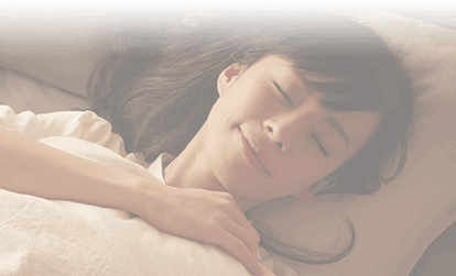 Woman sleeping soundly in bed